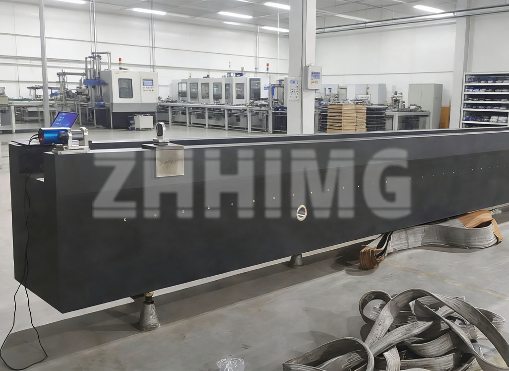 cleaning and maintaining a large granite surface plate - measurement work on a granite component in the workshop